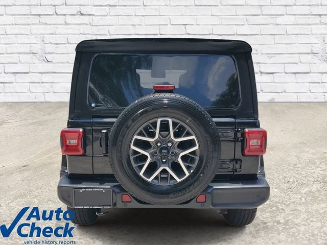 2024 Jeep Wrangler — rear three-quarter view