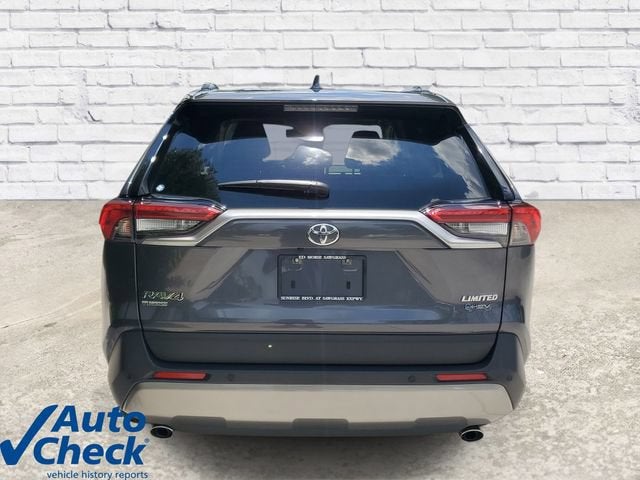 2025 Toyota RAV4 — rear three-quarter view